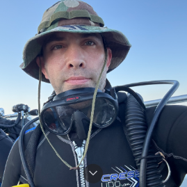 Portrait of Ephraim Conway in diving gear