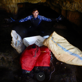 Ioannis Savva conducting fieldwork in a sea cave
