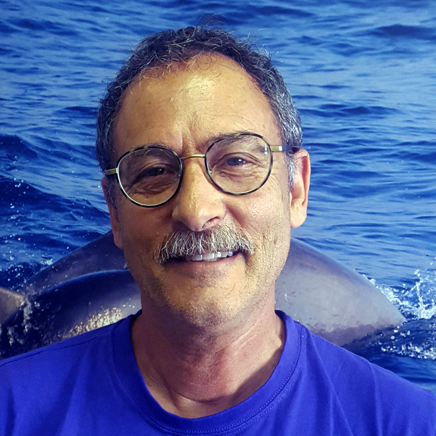 Portrait of Professor Dror Angel in front of the sea